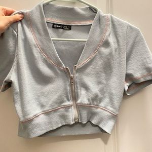 Plunging front zip up puff sleeve crop top